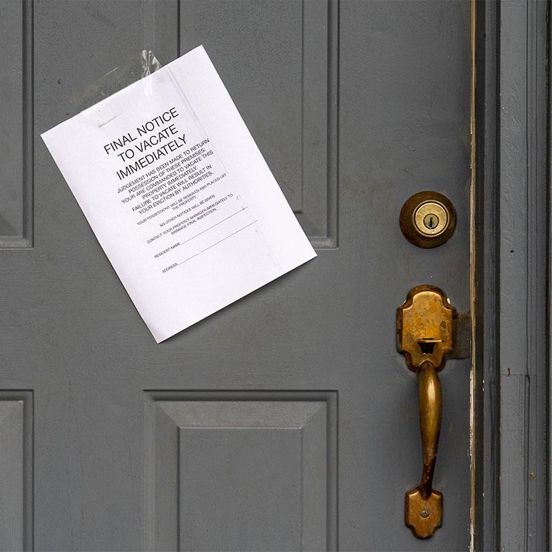 eviction notice taped to the door of a home