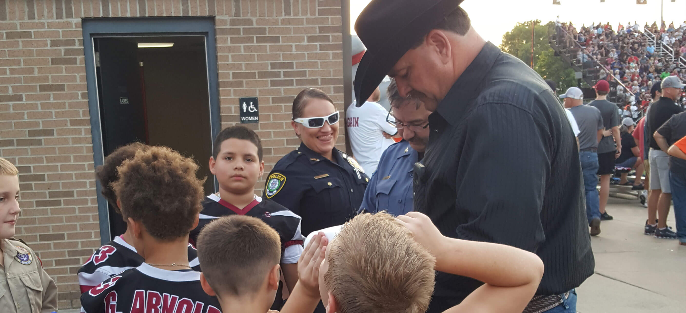 sheriff at elementary school delivering supplies